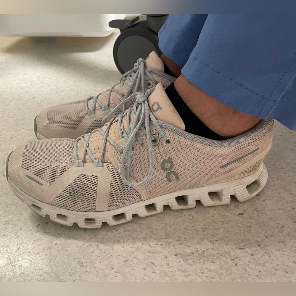 On Running Gray and White Athletic Shoes with Cloud Cushioning